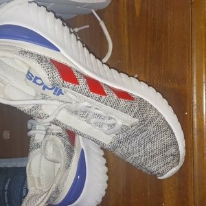 Adidas sz 7 red,white,blue in color.